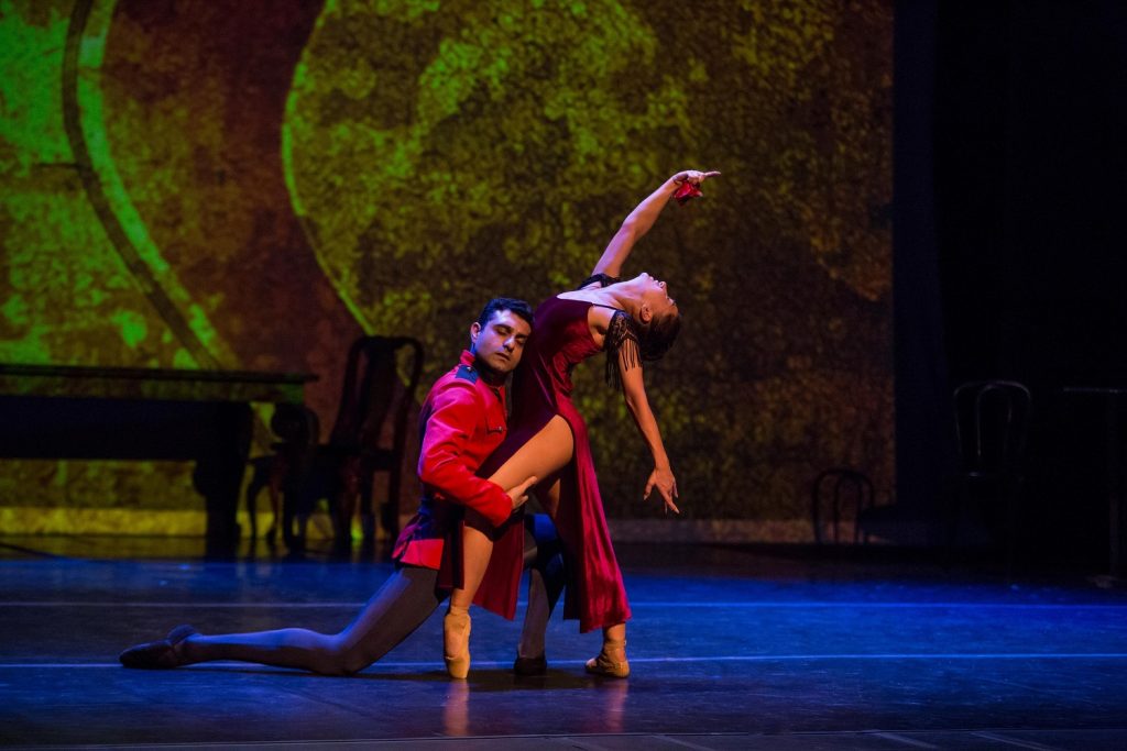 Photo 1 - (l to r) Grigori Arakelyan as Don José and Elen Harutyunyan as Carmen CARMEN ACT 1 TAVERN PASTIA - Photo by Cheryl Mann