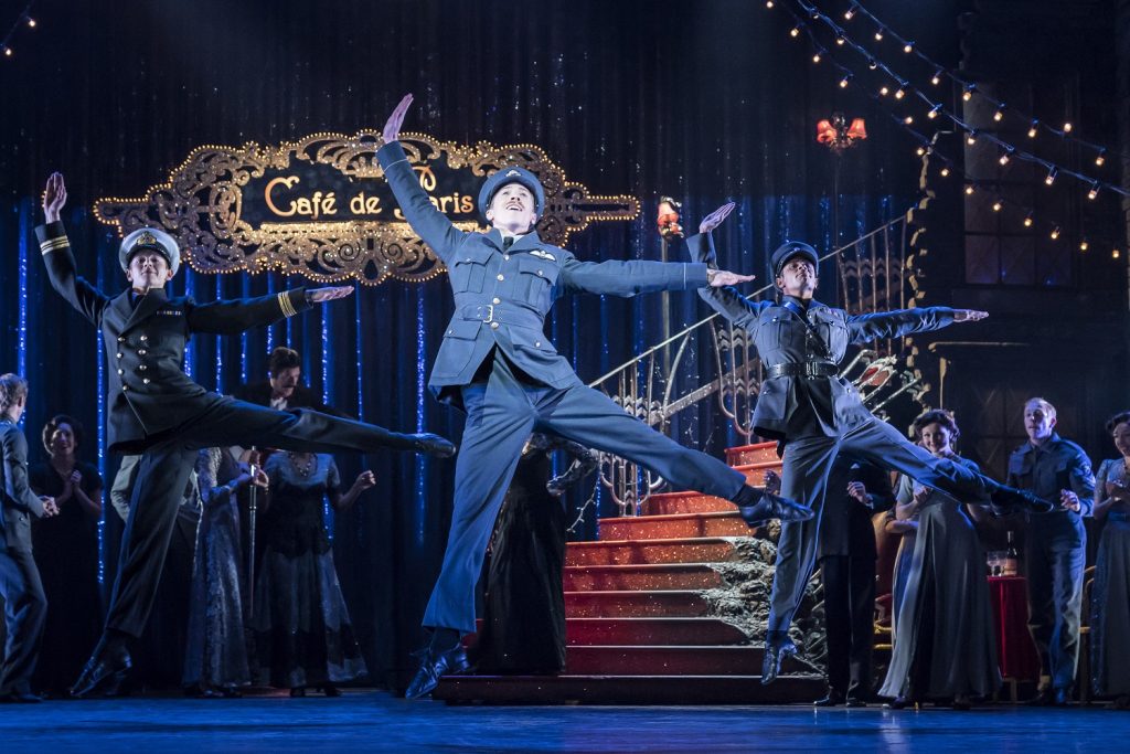 Andrew Monaghan (center) with the company in Matthew Bourne’s CINDERELLA