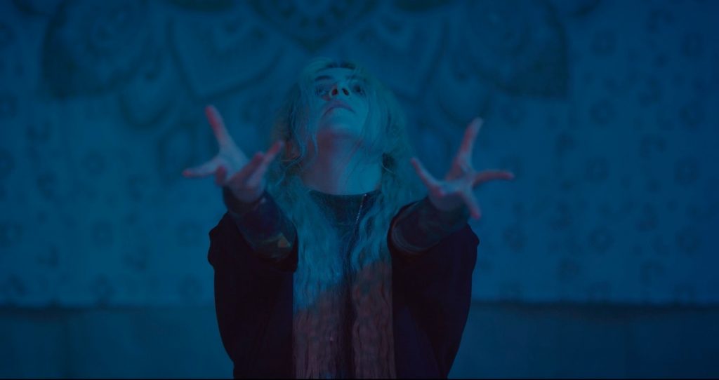 Nadine Olmo - Screenshot from SLOW DOWN TIME - Courtesy of Katie Malia