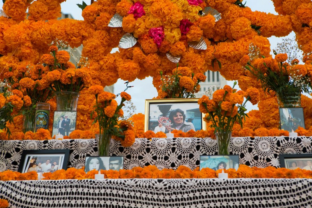 Honoring those who have passed in the Community Altar at Grand Park's Downtown Dia de los Muertos 2020 - Photo by Beau Ryan