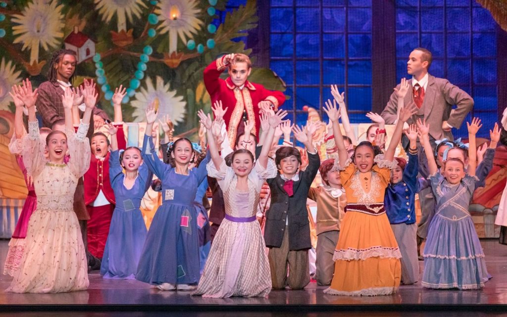 Inland Pacific Ballet's "The Nutcracker" - Children at the Stahlbaum family's annual holiday party excited to get gifts - Photo Copyright E.Y. Yanagi
