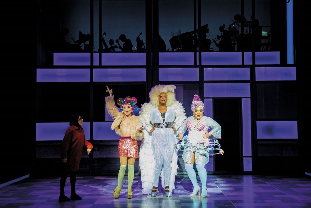 L-R Hiba Elchikhe as Pritti Pasha, James Gillan as Tray Sophisticay, Leon Craig as Sandra Bollock, David O'Reilly as Laika Virgin - Photo by Johan Persson