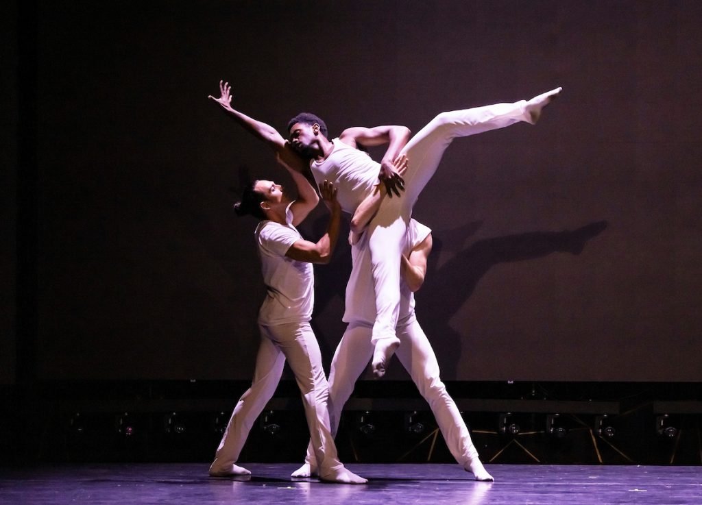 Luminario Ballet - Adrian Hoffman, Wil Geary, Raymond Ejiofor (being lifted) in "Tend" choreography by Adrian Hoffman - Photo by Ted Soqui