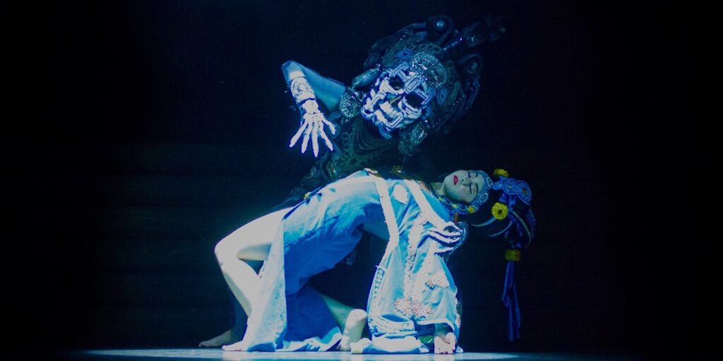Grandeza Mexicana Folk Ballet Company - Dancers: Cristina Romero (Death) and Alexia Espinoza (Princess) - Photo by Luis Gonzalez