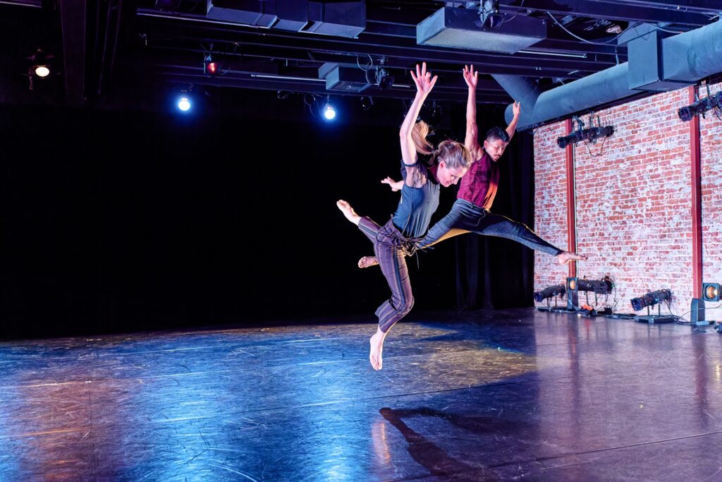 Deborah Rosen and Dancers - Sara Scrimshaw (front) and Jose Argueta in "FRAG mented" - Photo by George Simian