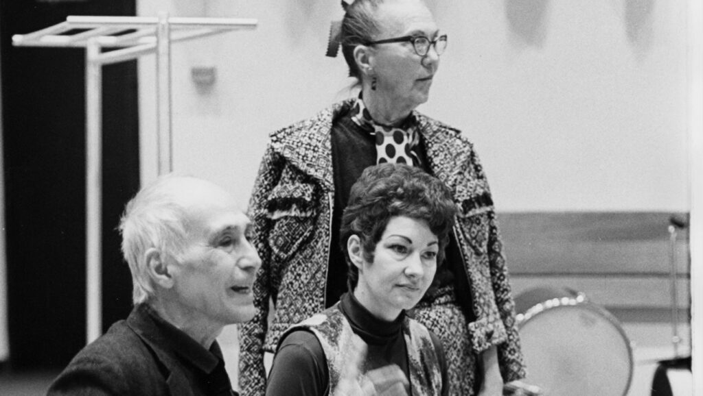 Martha Hill (standing), José Limón and unknown woman sitting watching rehearsal at Julliard School - Screenshot courtesy of OVID.
