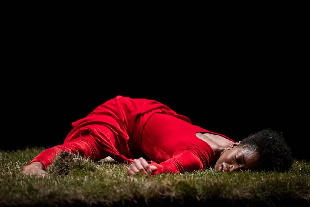 Tamisha A. Guy in Bebe Miller’s “Rain,” a solo from 1989 - Photo by Andrea Mohin/The New York Times