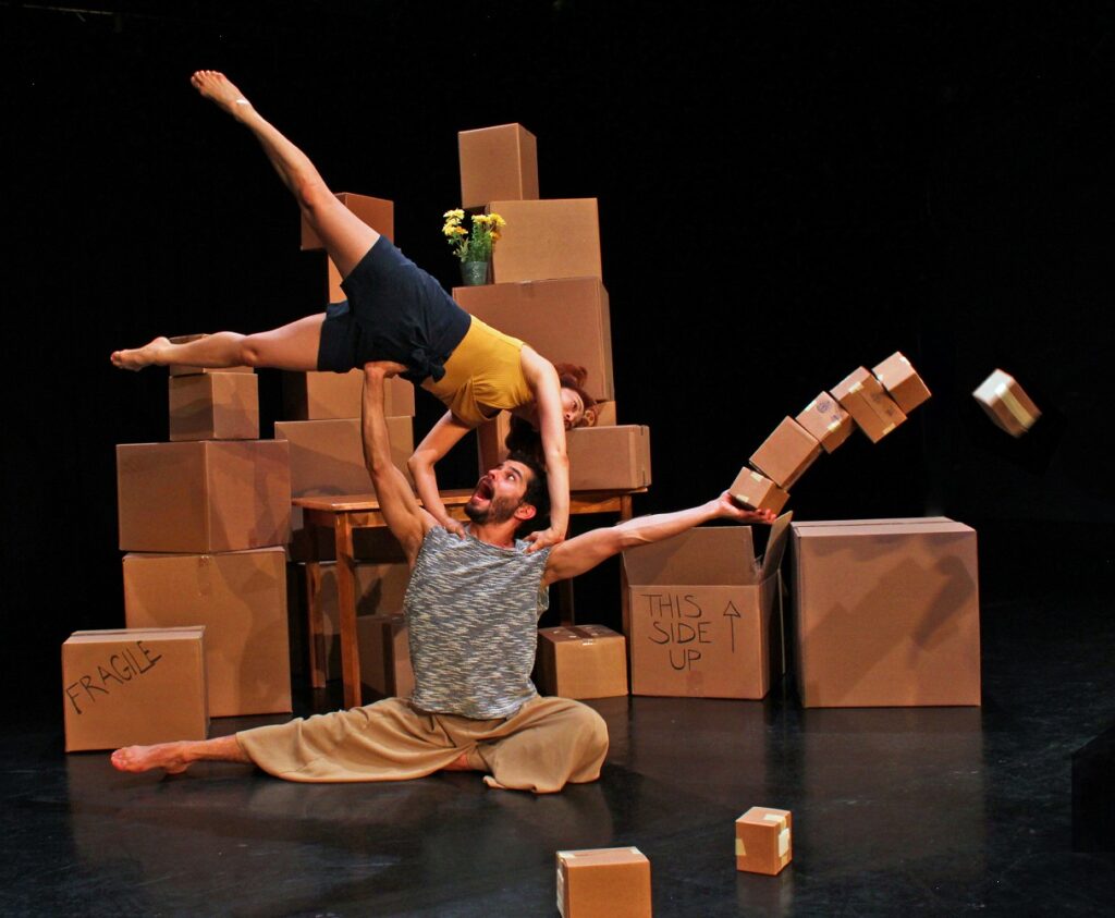 Invertigo Dance Theatre - Marco Palomino (seated) and Hyosun Choi in "Interior Design" - Photo by Luke Dakota Zender.