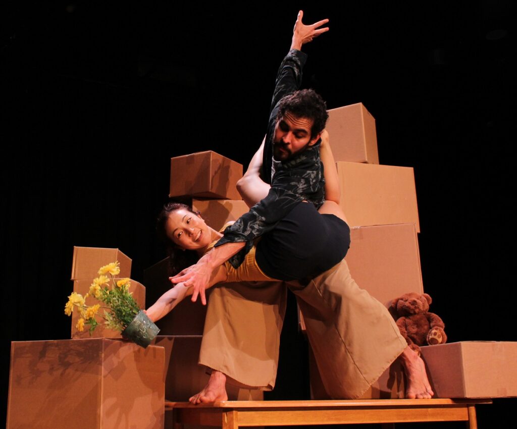 Invertigo Dance Theatre - Marco Palomino and Hyosun Choi (being lifted) in "Interior Design" - Photo by Luke Dakota Zender.