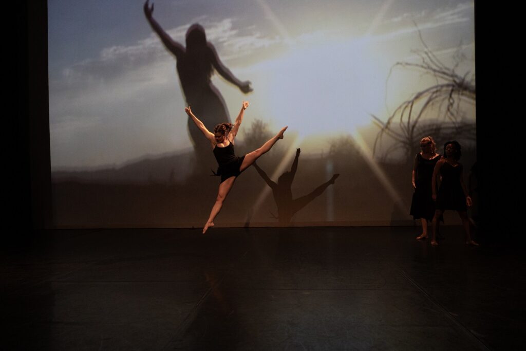 BrockusRED in "Had We But World Enough and Time - Center dancer Mara Hancock - Photo by Denise Leitner.