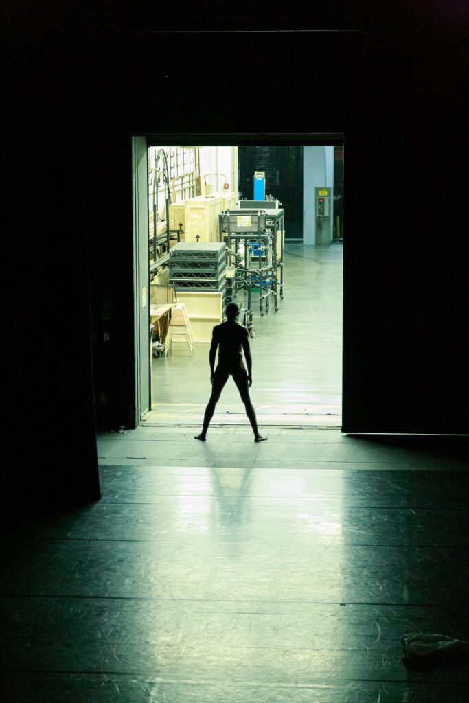 Paul Outlaw in "Big Black Cockroach" - Photo by Brian Hashimoto courtesy of REDCAT.
