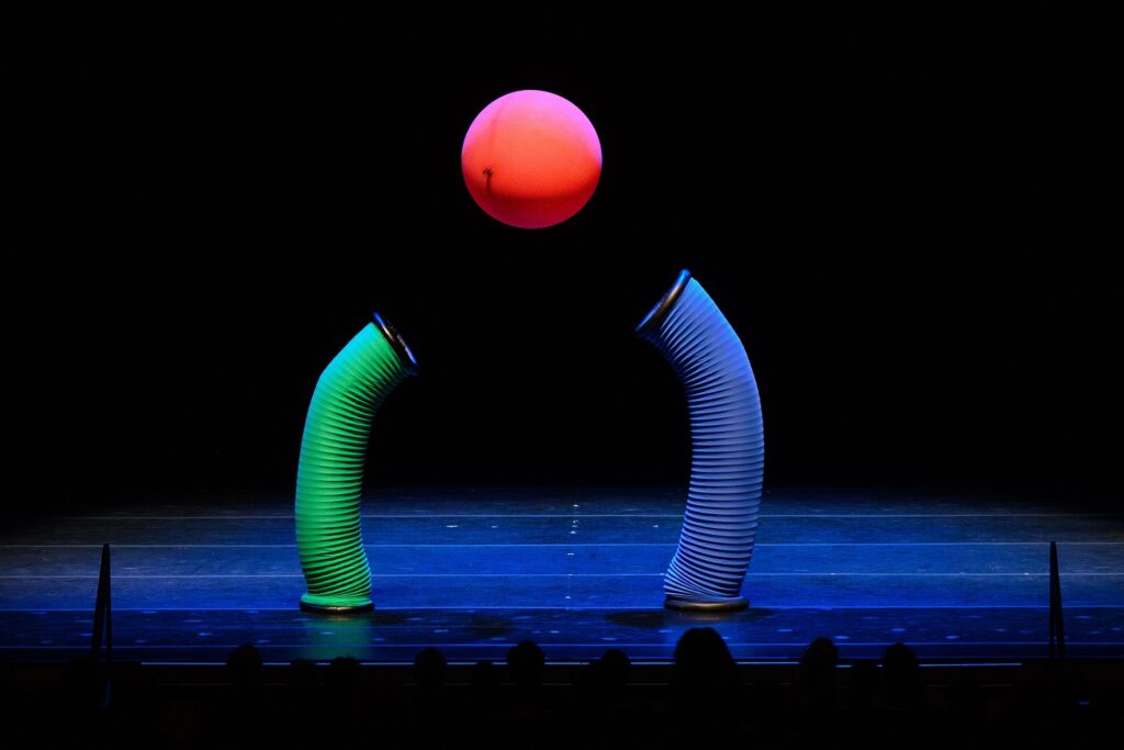 Mummenschanz performs an interactive piece at The Soraya on Nov. 2, 2024, at times sending the red ball into the audience for them to push back to the stage. | Photo: Braden Villanueva, The Soraya