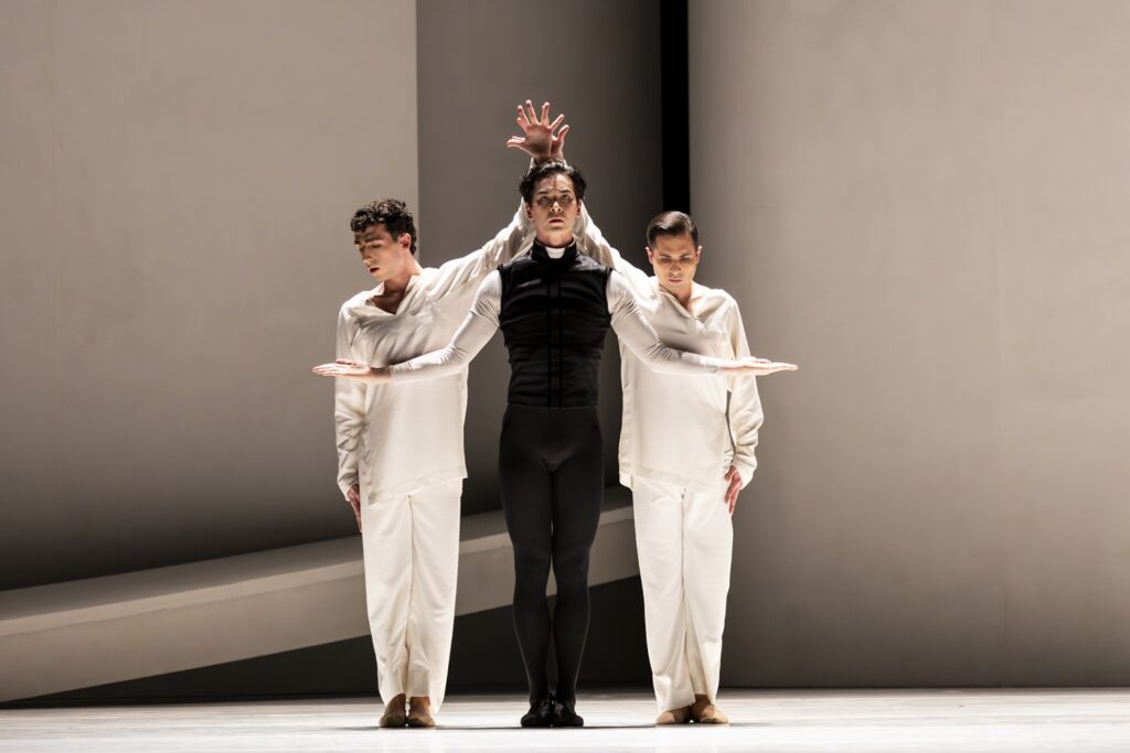 Pacific Northwest Ballet soloist Christopher D’Ariano (center) as Friar Laurence, with corps de ballet dancers Noah Martzall and Ryan Cardea, in Jean-Christophe Maillot’s Roméo et Juliette - Photo by Angela Sterling.
