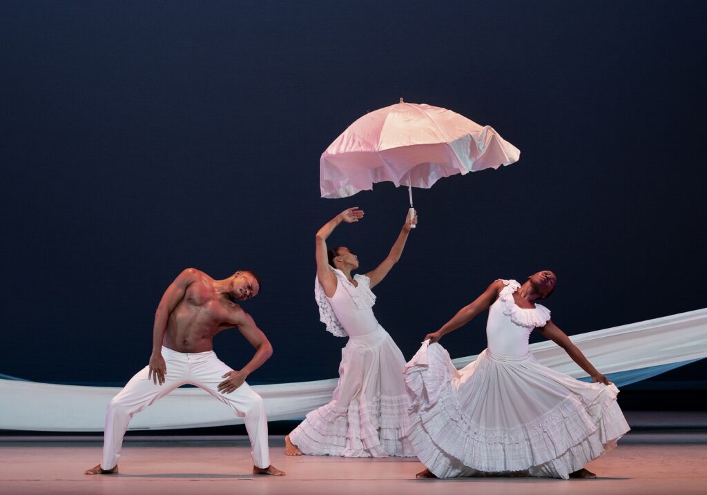 Alvin Ailey American Dance Theater - Solomon Dumas, Constance Stamatiou and Yazzmen Laidler in Alvin Ailey's "Revelations" - Photo by Paul Kolnik.