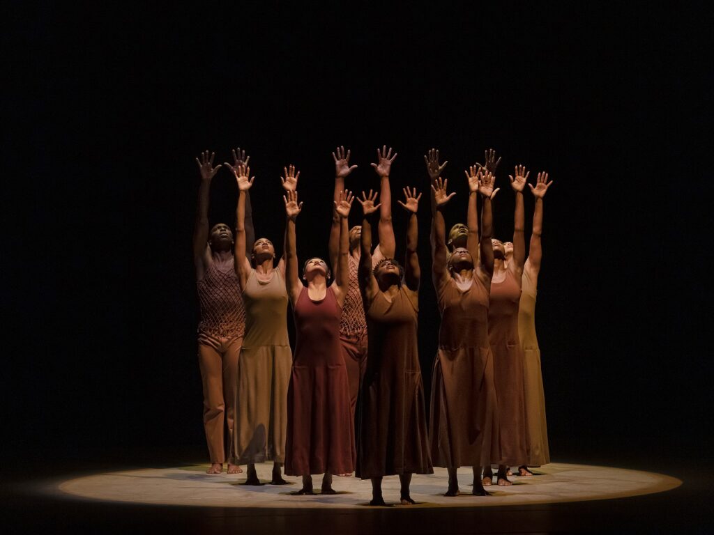 Alvin Ailey American Dance Theater in Alvin Ailey's "Revelations" - Photo by Paul Kolnik.