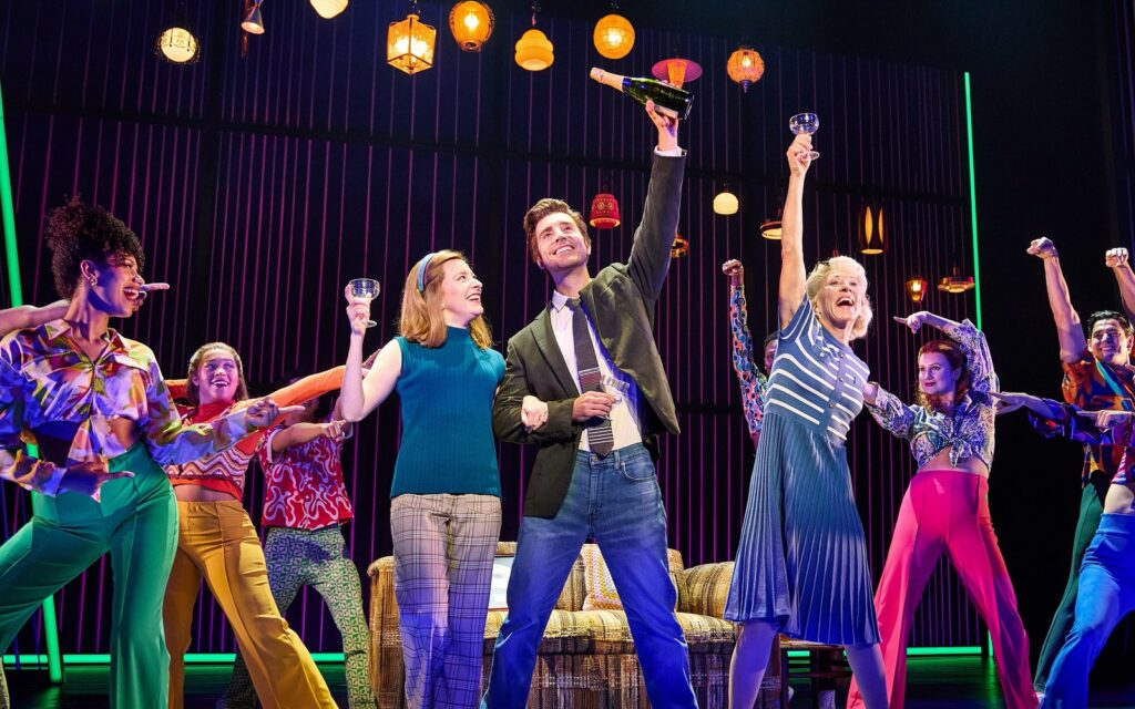 (Center left) Tiffany Tatreau as 'Jaye Posner,' Nick Fradiani as 'Neil - Then' and Kate A. Mulligan as 'Ellie Greenwich' in A Beautiful Noise The Neil Diamond Musical - Photo by Jeremy Daniel.