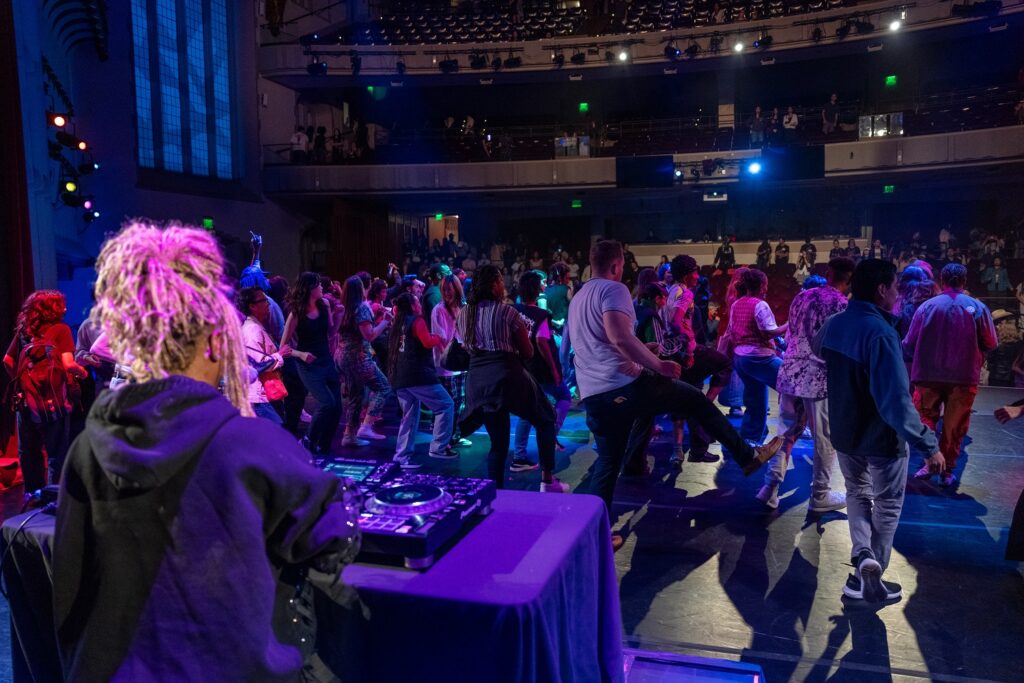 Visions and Voices - Decades of Dance in LA - DJ Ninabutterfly with audience dancing - Photo by Henry Kofman.