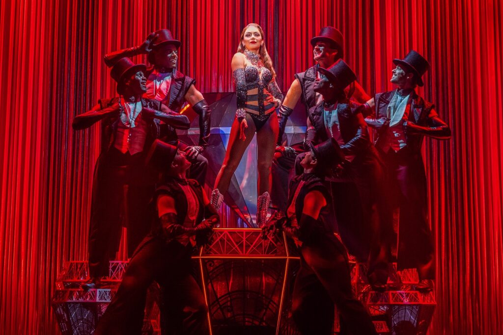 Arianna Rosario (center) and the Company of the 2024 touring production of MOULIN ROUGE! THE MUSICAL - Photo by Matthew Murphy and Evan Zimmerman for MurphyMade.