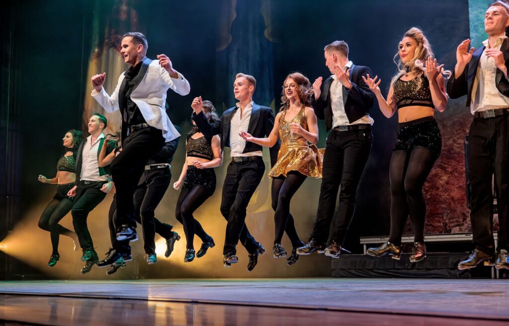 Cian Walsh and the ensemble in "A Taste of Ireland" - Photo by Chris Hardy.