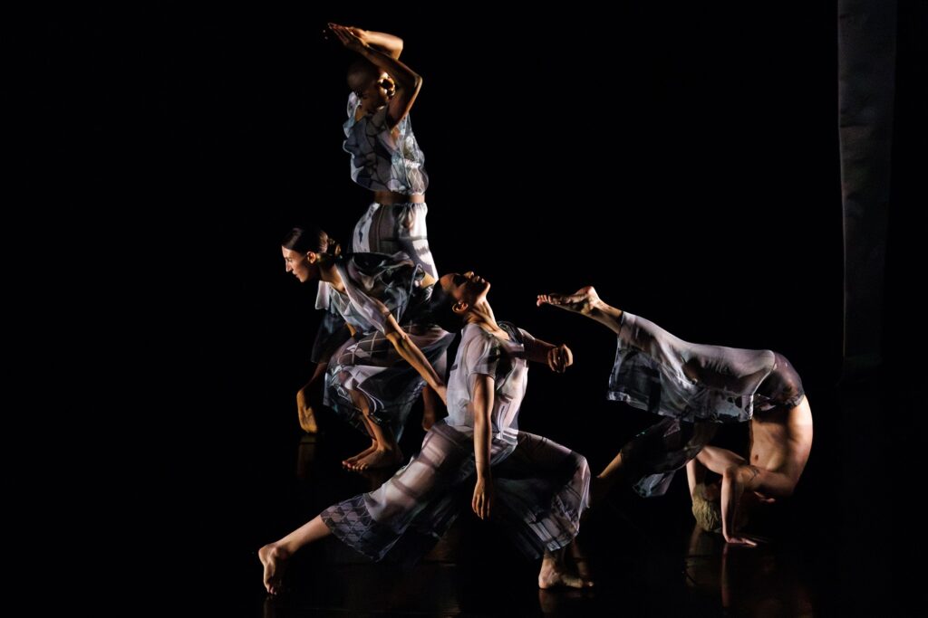 Trisha Brown Dance Company - Set and Reset (1983), Choreography by Trisha Brown - Dancers Catherine Kirk, Ashley Merker, Jennifer Payán, Spencer Weidie - Photo by Ben McKeown, courtesy of the American Dance Festival.