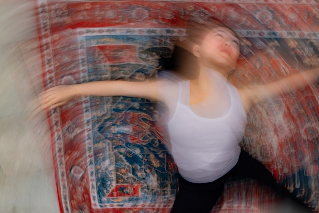 Excerpt of “The Döppelganger” from Loneliness Triptych at the Brand Library. Choreography by Mamie Green. Performer Anne Kim. Photo by Skye Schmidt Varga.