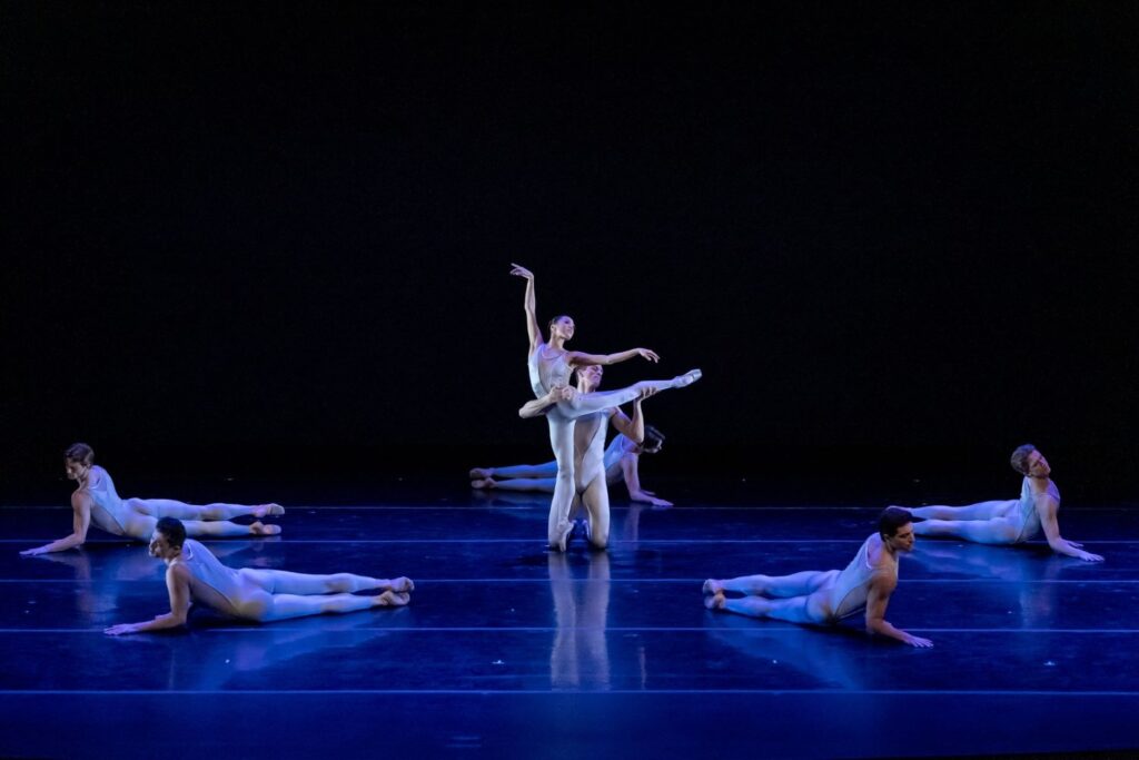 Joffrey Ballet's Dylan Gutierrez and Jeraldine Mendoza with Evan Boersma, Jonathan Dole, Derek Drilon, Jackson Miles and Davide Oldano performing Gerald Arpino's "Round of Angels" - Photo by Cheryl Mann.