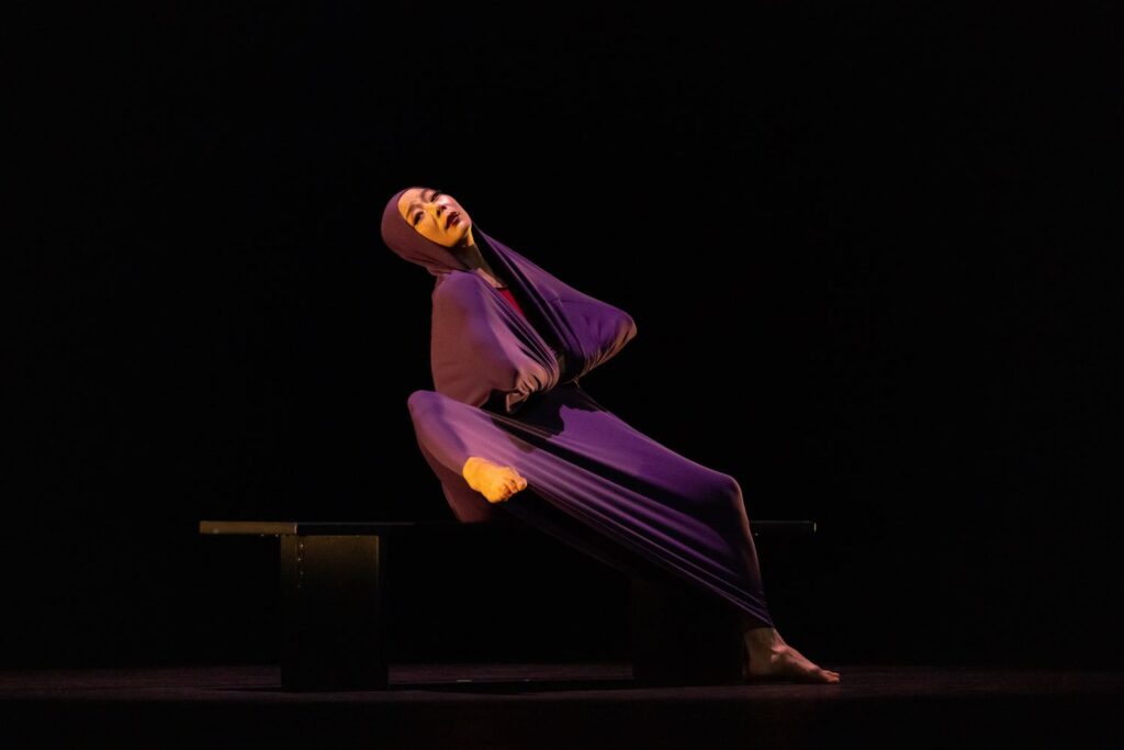 Martha Graham Dance Company - Xin Ying in Graham's "Lamentation" - Photo by Mackenzee Osborne.