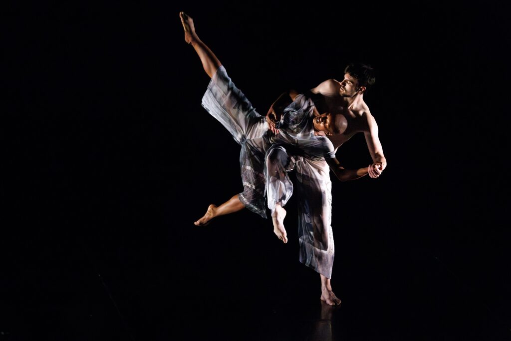 Trisha Brown Dance Company - "Set and Reset" (1983) - Choreography by Trisha Brown - Dancers: Patrick Needham, Catherine Kirk - Photo by Ben McKeown, courtesy of the American Dance Festival.