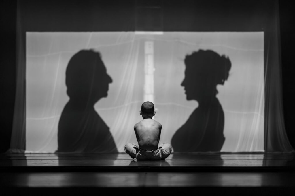 Jacob Jonas The Company - "Product of Divorce" Choreography by Jacob Jonas - Kai Inoue seated center - Photo by Joshua Geyer.