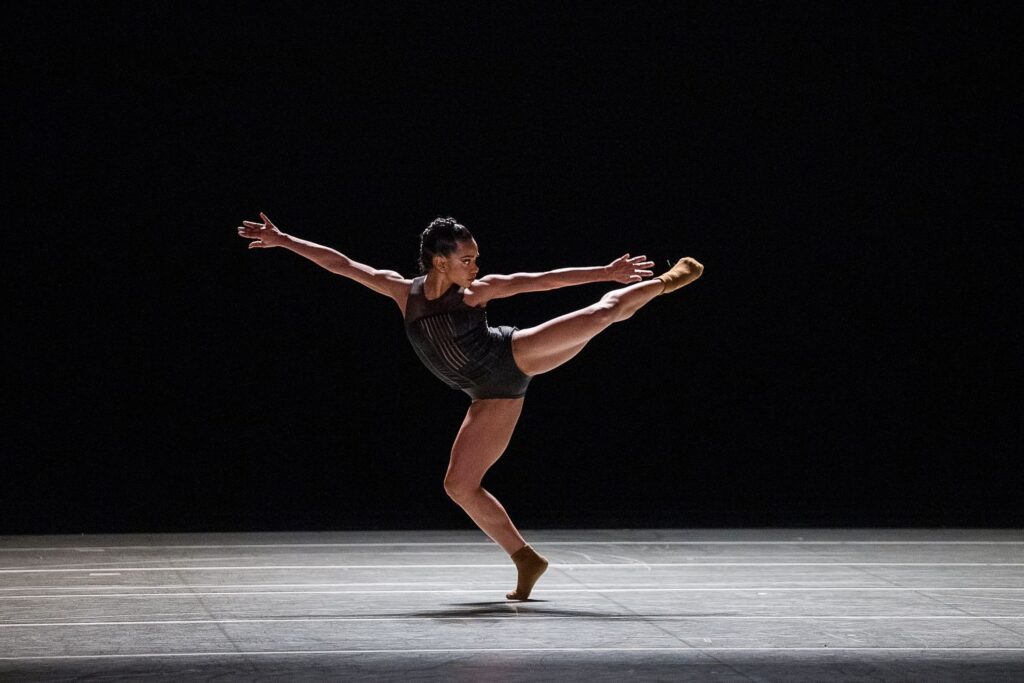 Alvin Ailey American Dance Theater - Dandara Veiga in Medhi Walerskis' "Blink of An Eye" - Photo by Christopher Duggan.