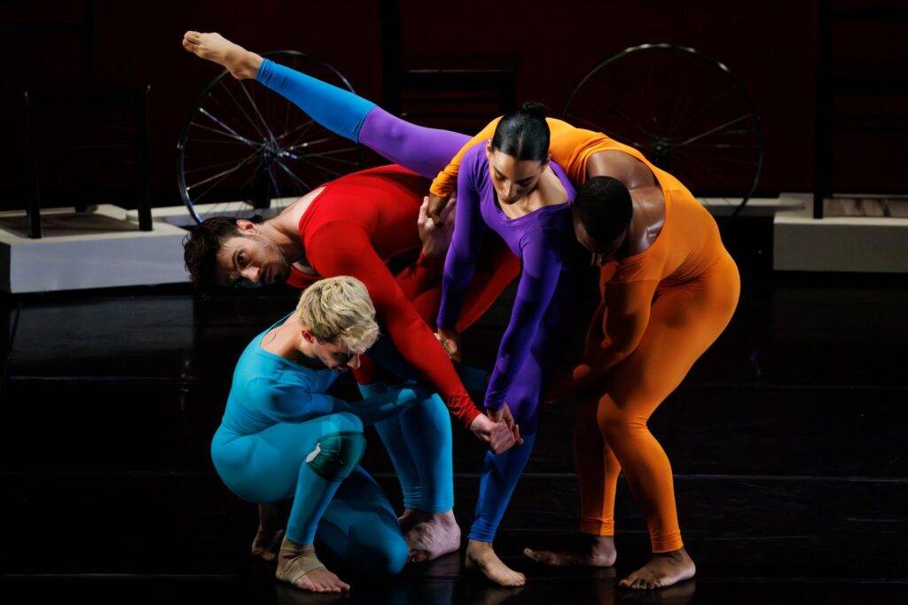 Trisha Brown Dance Company in "Travelogue" (1977) Choreography by Merce Cunningham - Performers: Spencer Weidie, PatrickNeedham, Jennifer Payán, Claude CJ Johnson - Photo by Ben McKeown, courtesy of the American Dance Festival.