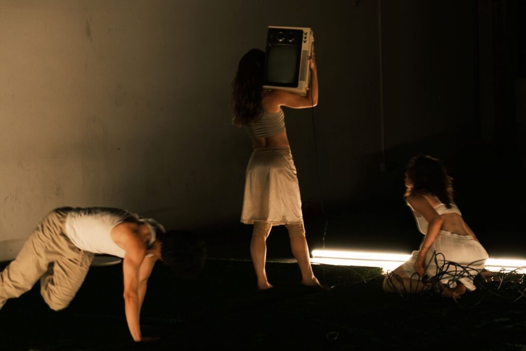Empara - Kevin Lau, Eliza Loran, and Hanna Peddicord in Megan Paradowski's "Won't you come closer?" - Photo by Emiko Ohta.