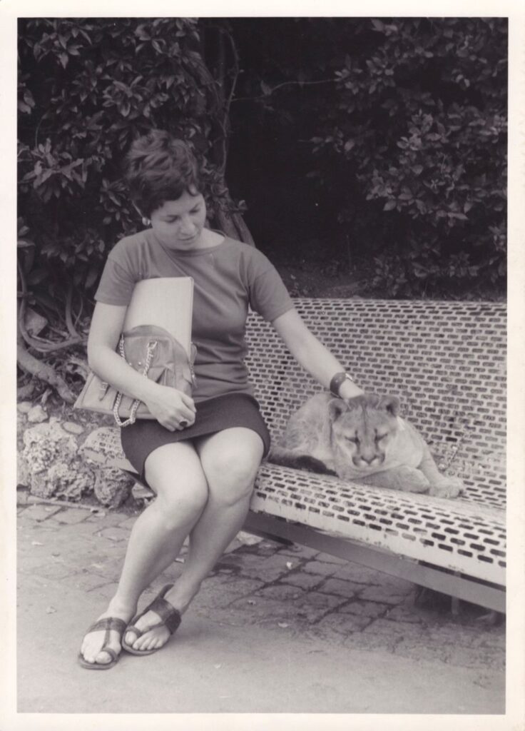 Simone with lion cub, Rome Zoo, 1968. Photographer unknown.