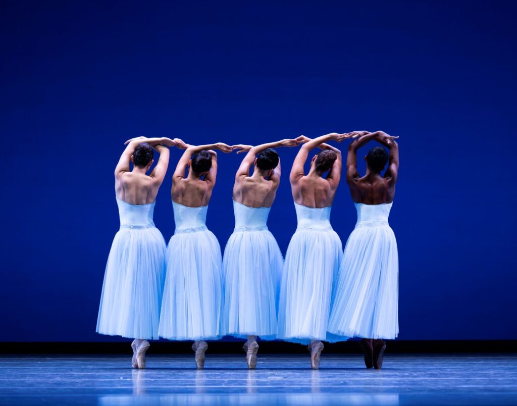 Pacific Northwest Ballet company dancers in "Serenade," choreographed by George Balanchine © The George Balanchine Trust. PNB presents Serenade - Photo by Angela Sterling.
